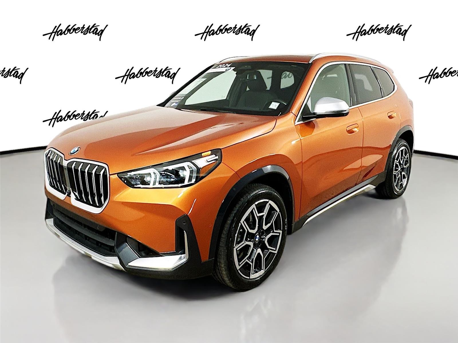 Certified Used 2024 ORANGE BMW xDrive28i image 1