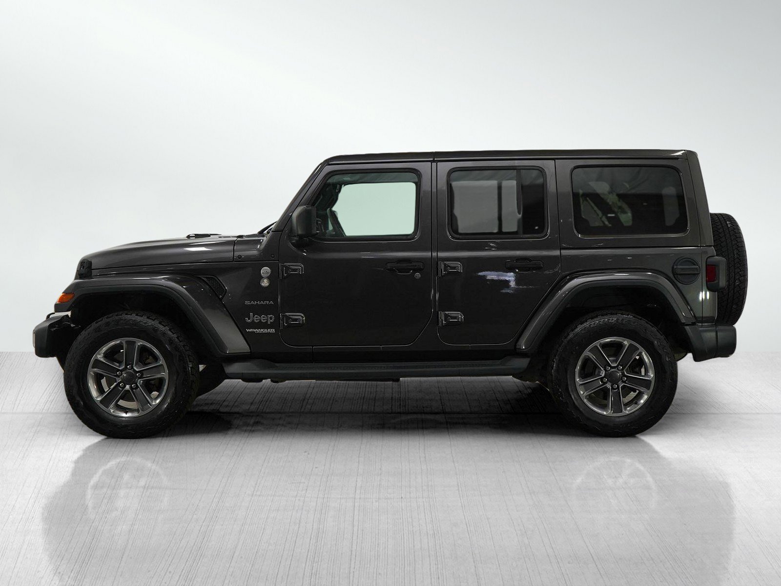 Used 2019 Jeep Wrangler Unlimited Sahara with VIN 1C4HJXEG0KW674020 for sale in Wayzata, Minnesota