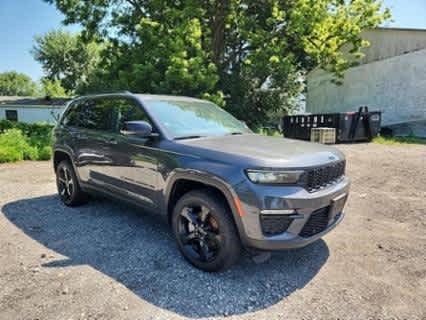 Certified 2022 Jeep Grand Cherokee Limited with VIN 1C4RJHBGXN8635233 for sale in Brooklyn Park, Minnesota