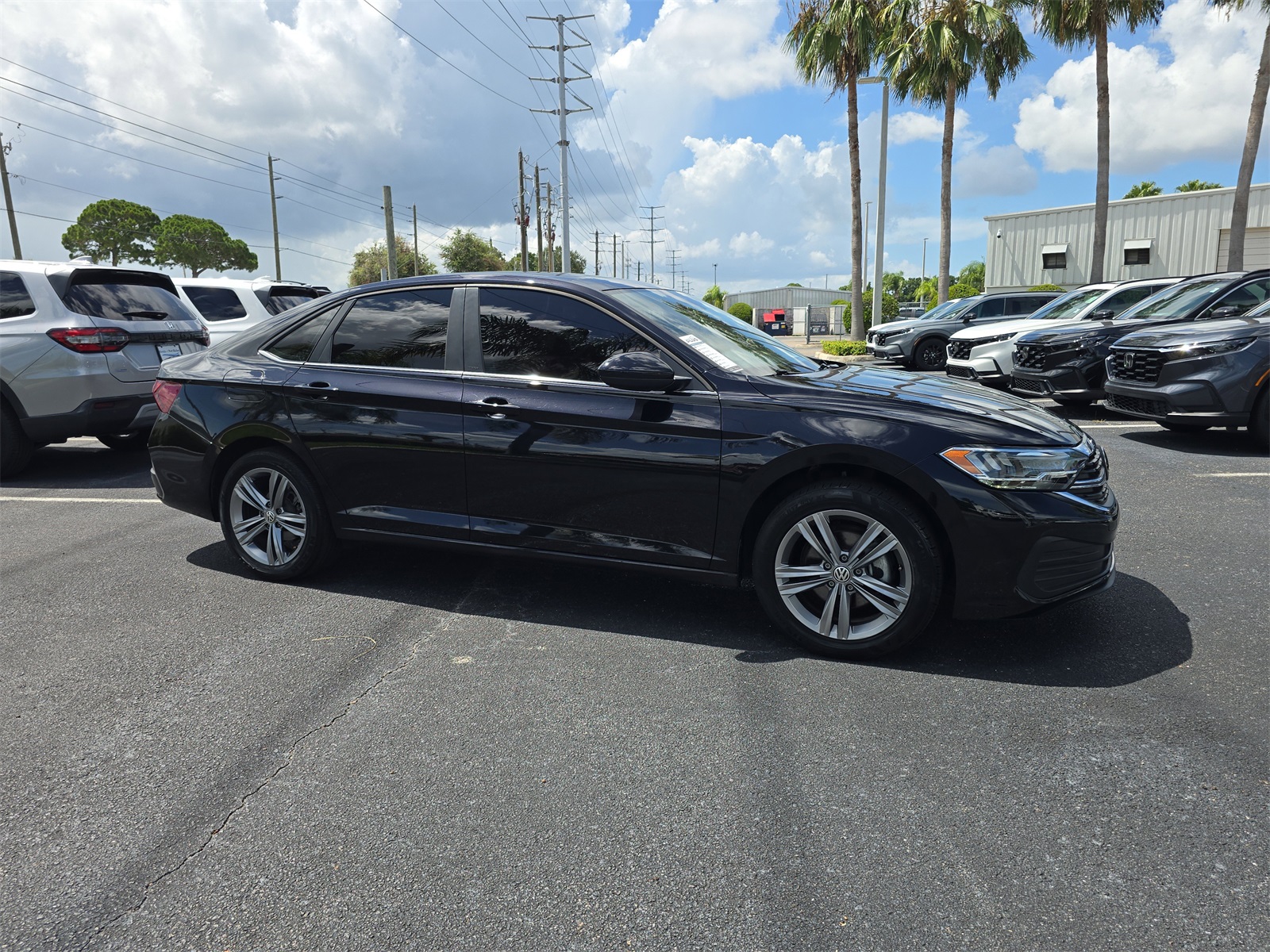 Used 2023 Volkswagen Jetta SE with VIN 3VW7M7BU9PM022272 for sale in Port Richey, FL