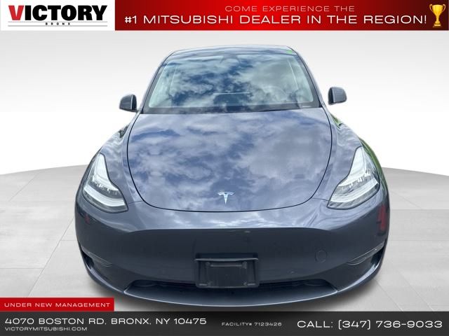 Used 2023 Tesla Model Y Long Range with VIN 7SAYGDEE8PA023029 for sale in Bronx, NY