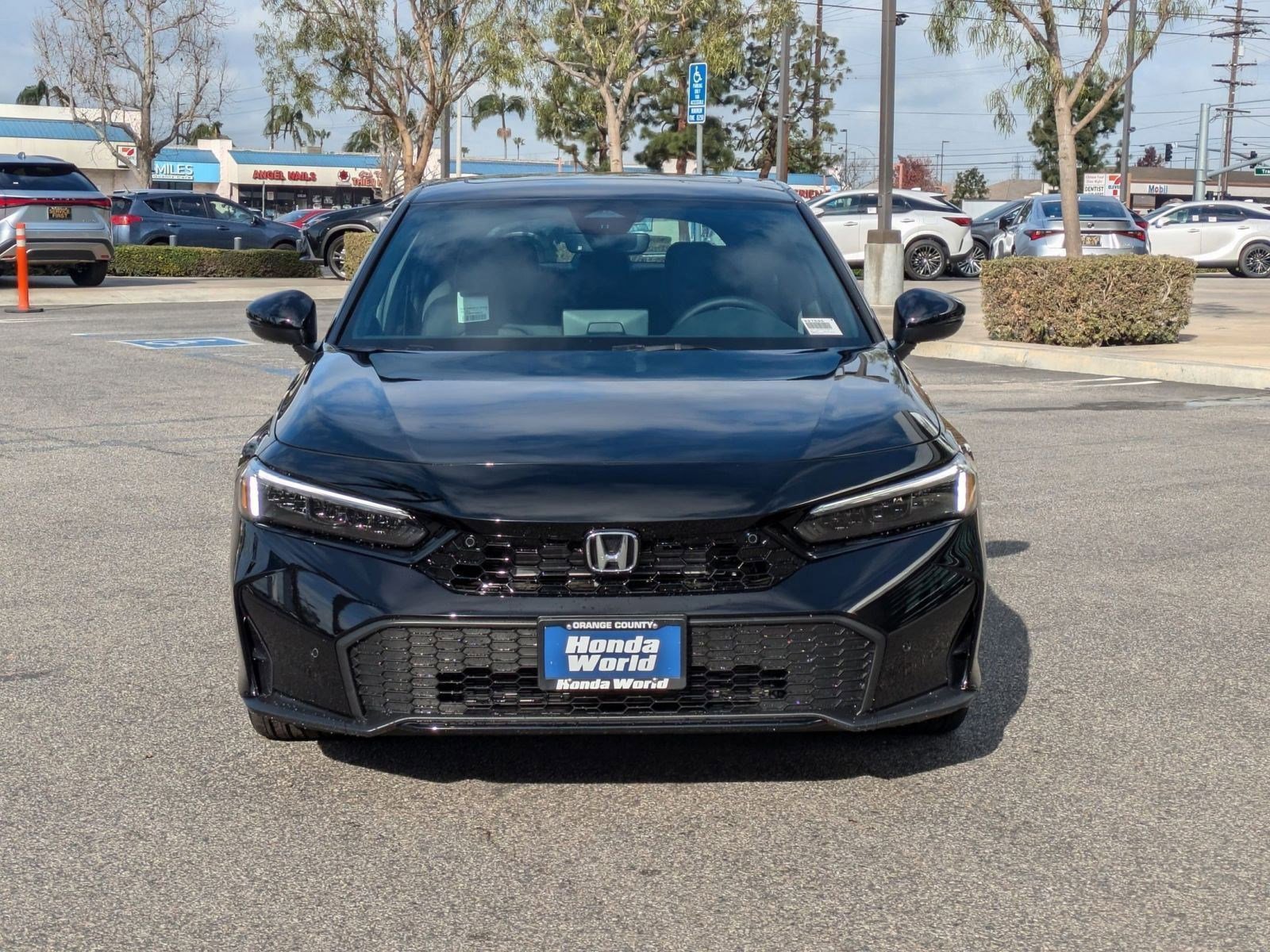 2026 Honda Civic Hatchback Hybrid Sport Touring photo 2