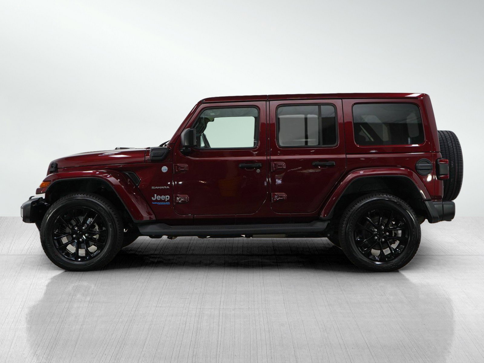 Used 2021 Jeep Wrangler Unlimited Sahara 4XE with VIN 1C4JJXP64MW682534 for sale in Hopkins, Minnesota