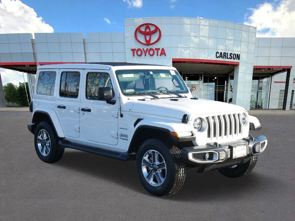 Used 2021 Jeep Wrangler Unlimited Sahara with VIN 1C4HJXENXMW546319 for sale in Minneapolis, Minnesota