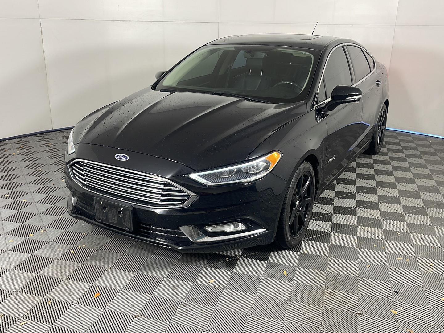 Used 2017 Ford Fusion Hybrid Titanium with VIN 3FA6P0RU7HR301751 for sale in Salida, CO