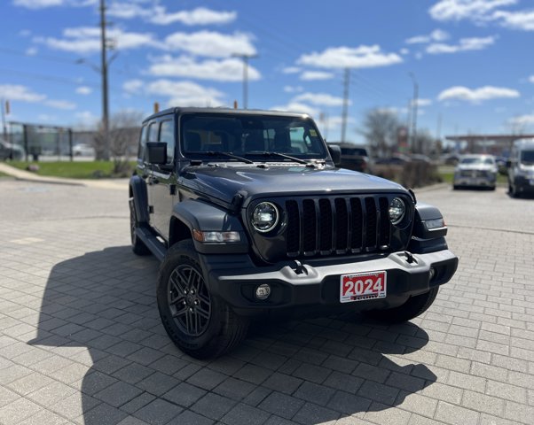 Used 2024 Granite Crystal Metallic Jeep Sport S image 1