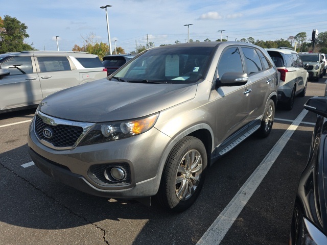 Used 2011 Kia Sorento EX with VIN 5XYKU4A29BG023021 for sale in St. Augustine, FL