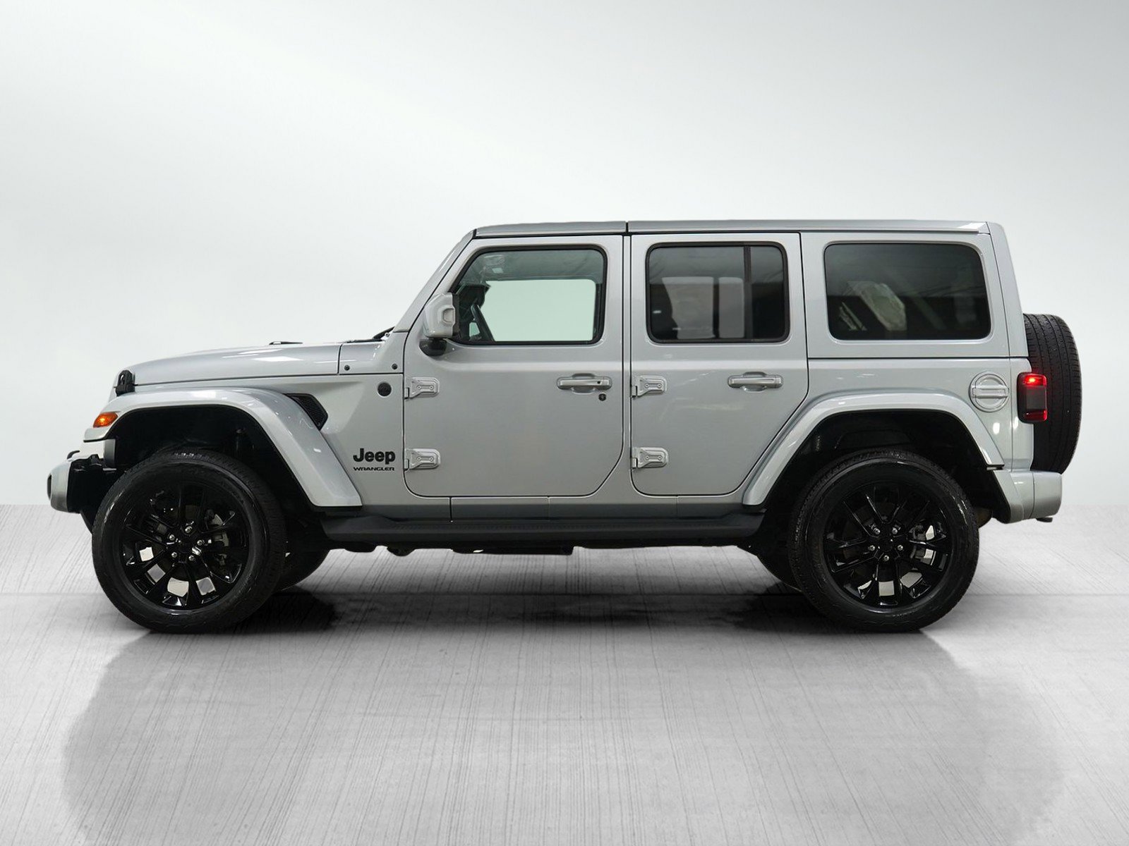 Used 2023 Jeep Wrangler 4-Door Sahara High Altitude with VIN 1C4HJXEN0PW587563 for sale in Hopkins, Minnesota