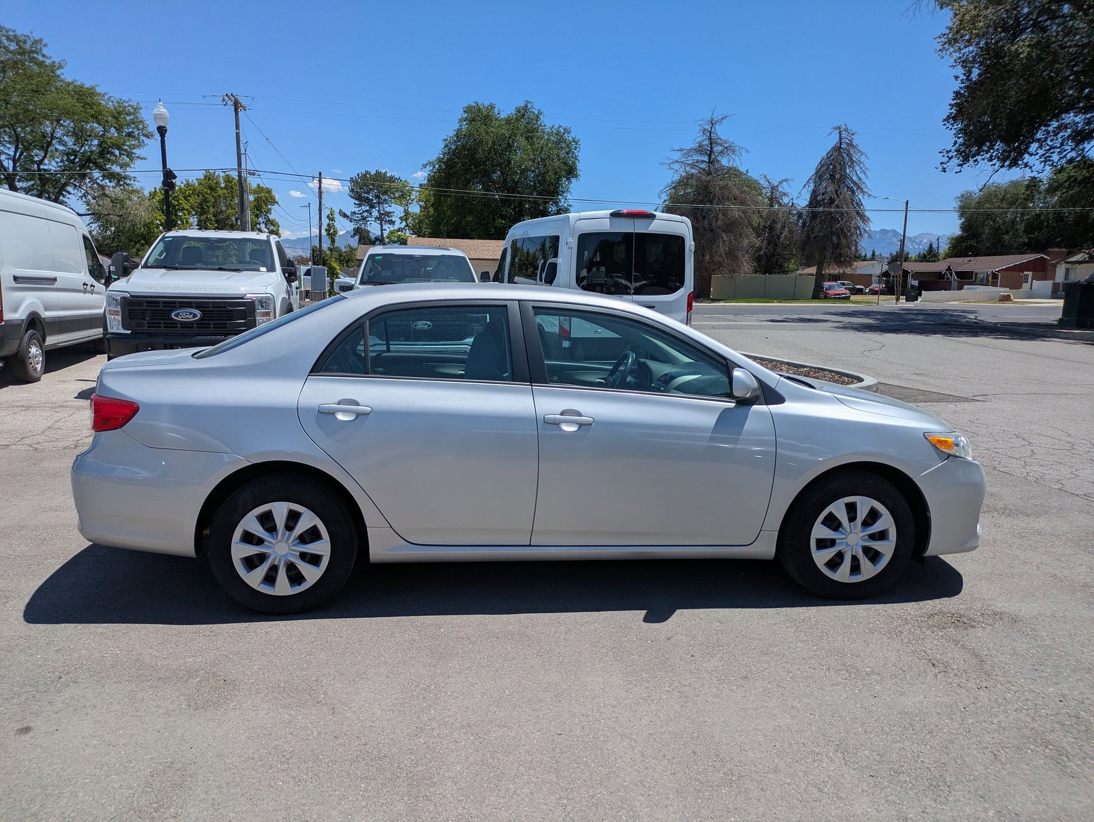 Used 2011 Toyota Corolla LE with VIN 2T1BU4EE2BC657030 for sale in West Valley City, UT