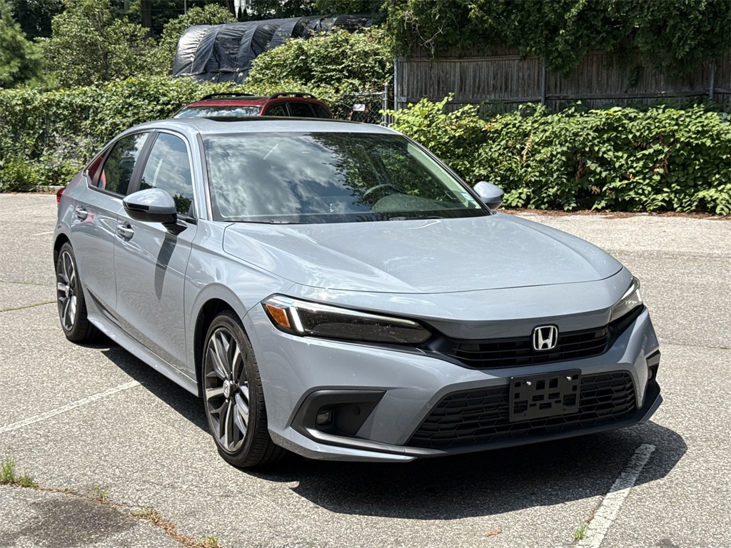 Used 2023 Sonic Gray Pearl Honda Touring image 1