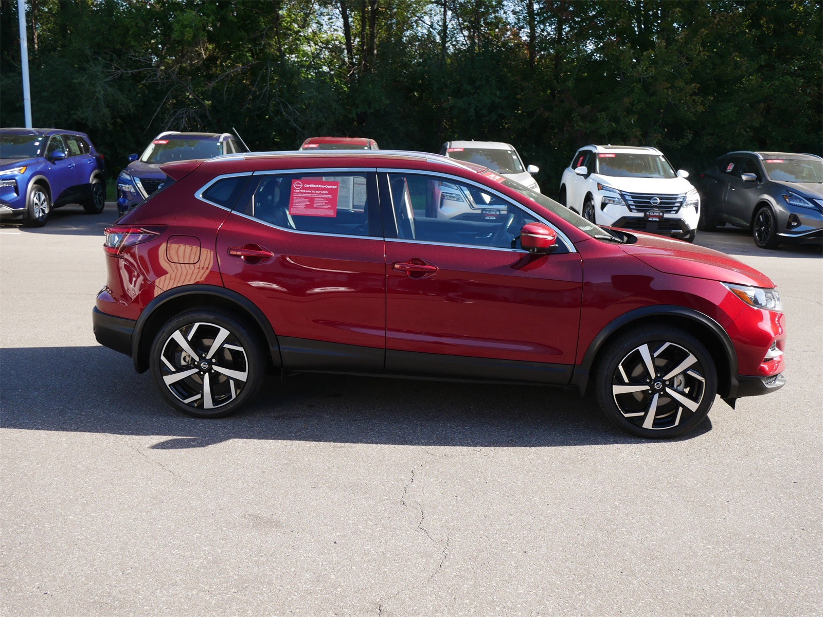 Certified 2022 Nissan Rogue Sport SL with VIN JN1BJ1CW0NW487557 for sale in Maplewood, Minnesota