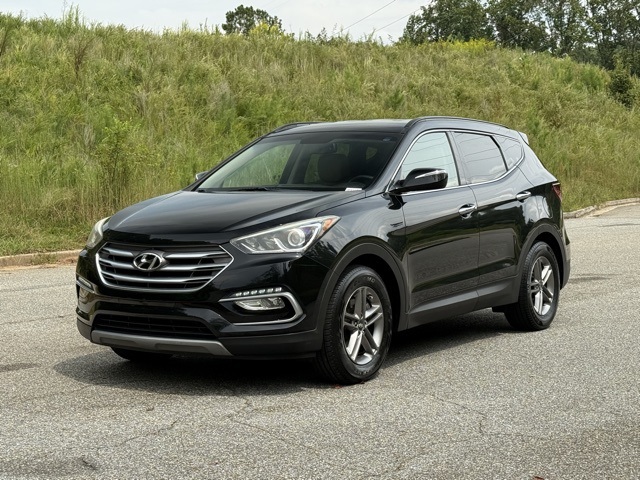 Used 2018 Hyundai Santa Fe Sport with VIN 5NMZUDLB7JH099059 for sale in Canton, GA