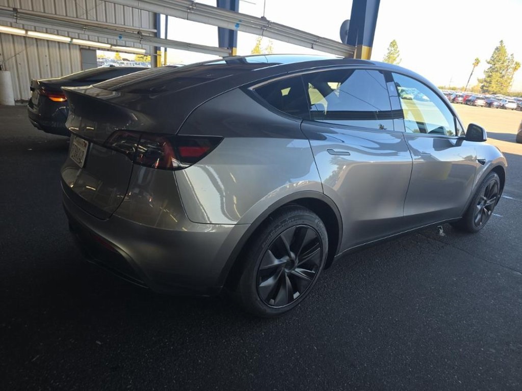 Used 2025 Tesla Model Y Long Range with VIN 7SAYGDED1SF319609 for sale in Northfield, Minnesota