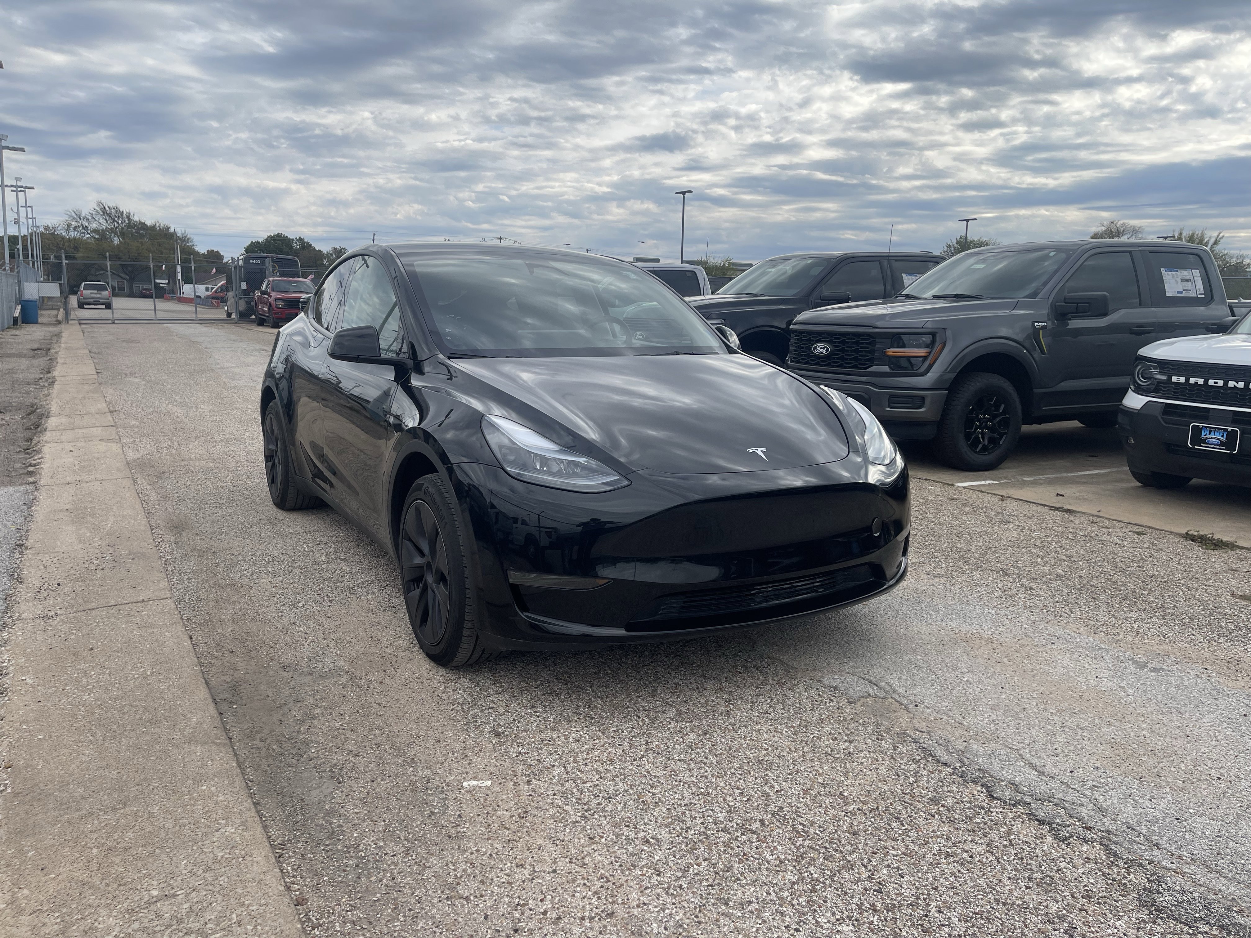 Used 2024 Tesla Model Y Long Range with VIN 7SAYGDED5RF201086 for sale in Northfield, Minnesota