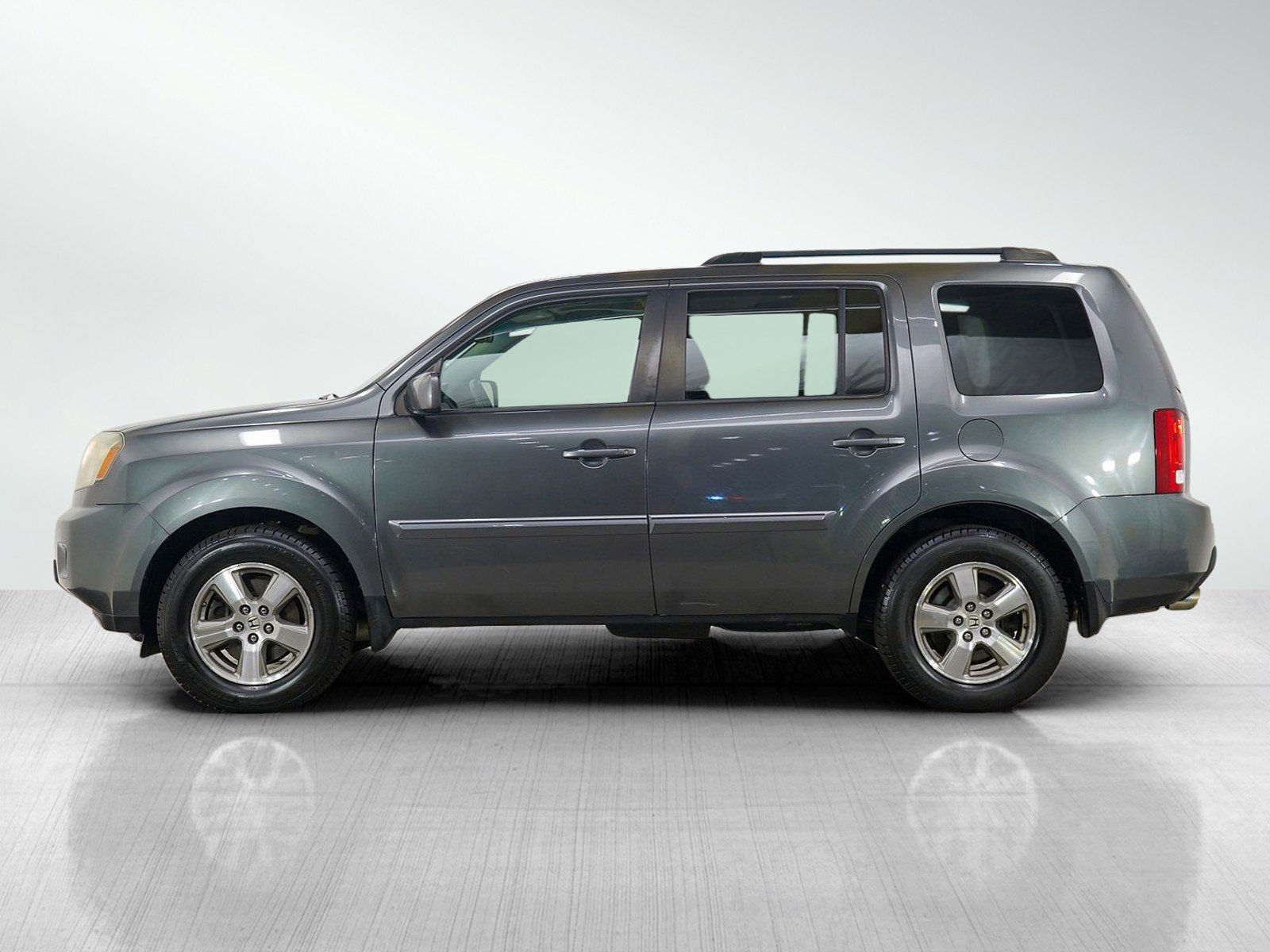 Used 2011 Honda Pilot EX-L with VIN 5FNYF4H51BB014325 for sale in Burnsville, Minnesota