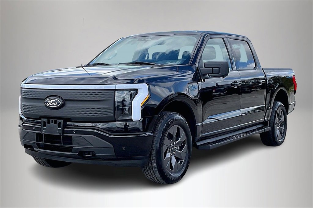 Used 2024 Ford F-150 Lightning Flash with VIN 1FT6W3L76RWG28061 for sale in Alvin, TX