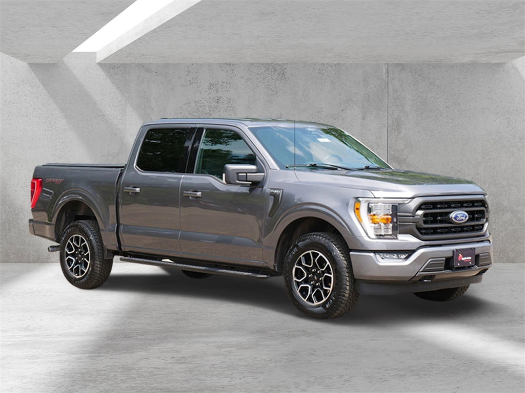 Used 2021 Ford F-150 XLT with VIN 1FTFW1E54MFA70266 for sale in White Bear Lake, Minnesota