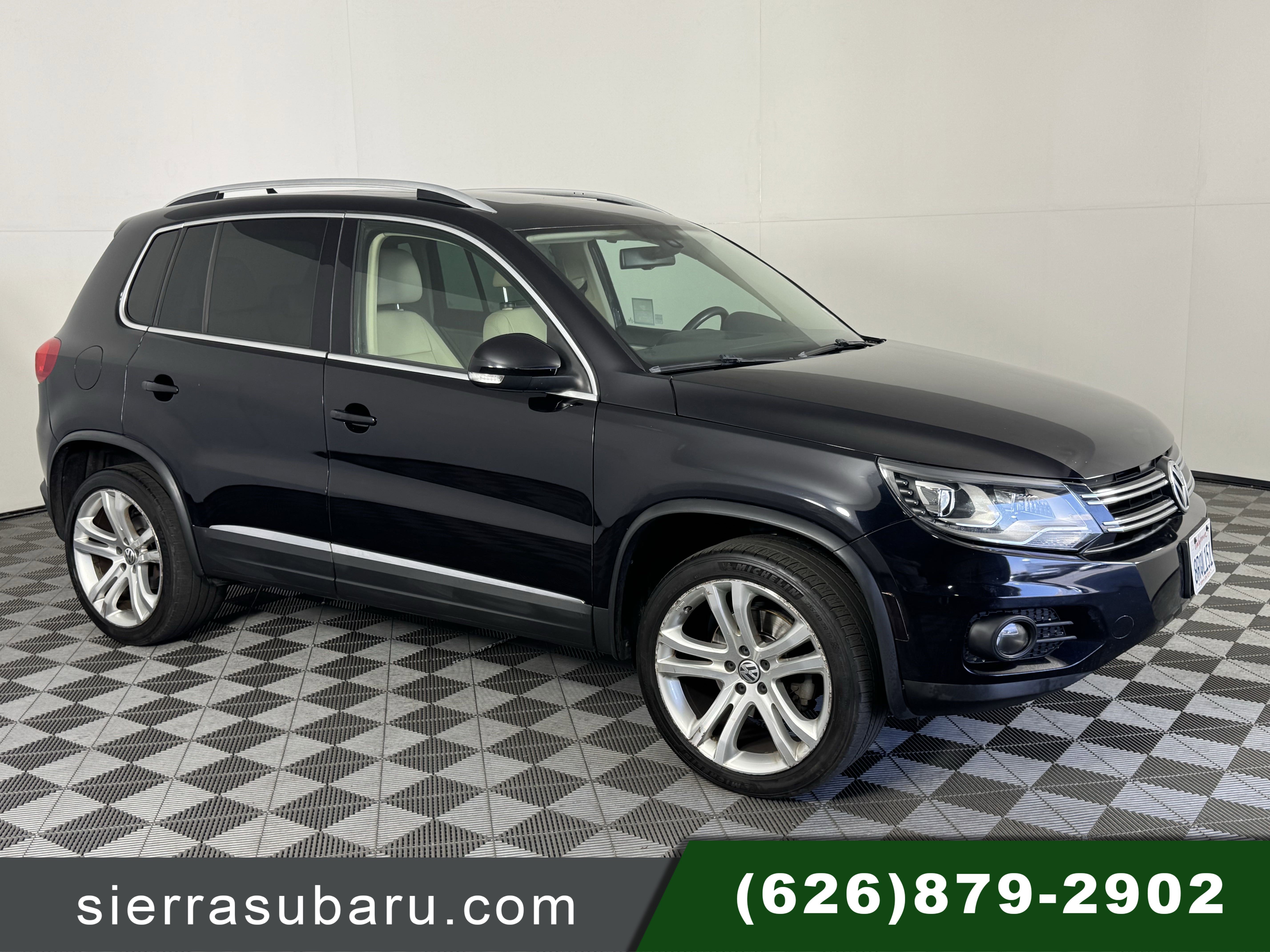 Used 2013 Deep Black Metallic Volkswagen SEL image 1