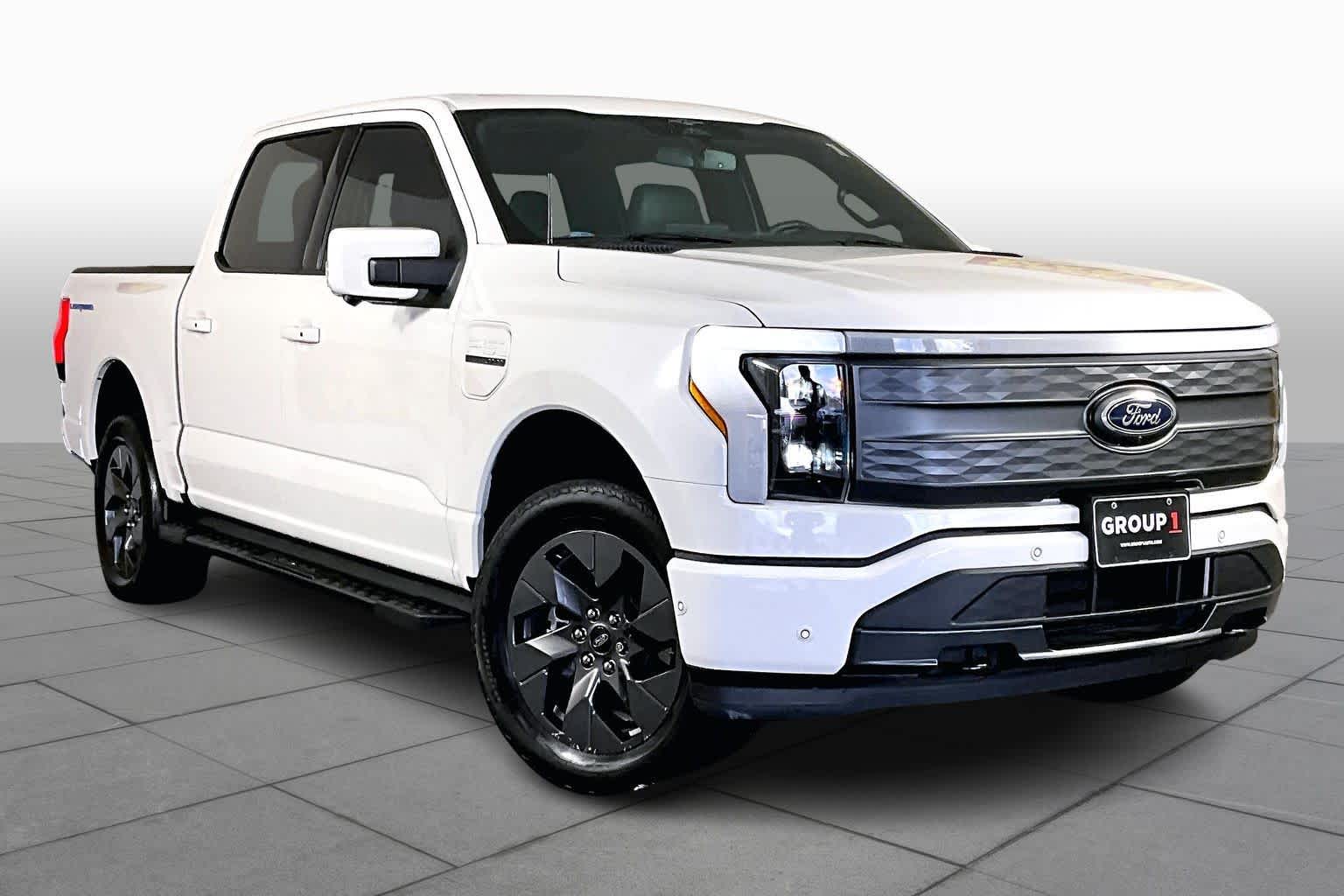 Used 2023 Ford F-150 Lightning Lariat with VIN 1FTVW1EV5PWG05959 for sale in Houston, TX