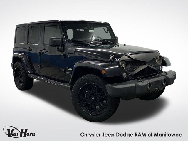 PRE-OWNED 2015 JEEP WRANGLER UNLIMITED SAHARA