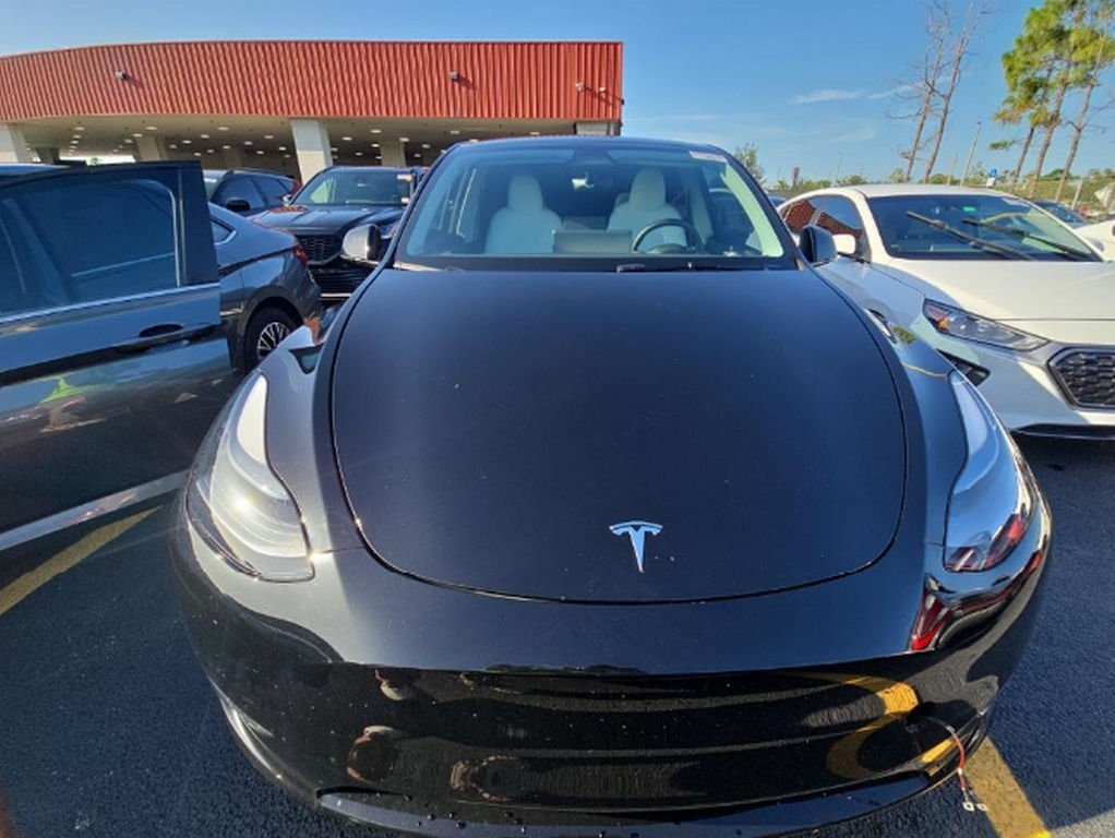 Used 2024 Tesla Model Y Long Range with VIN 7SAYGDEEXRA226863 for sale in Bedford, OH