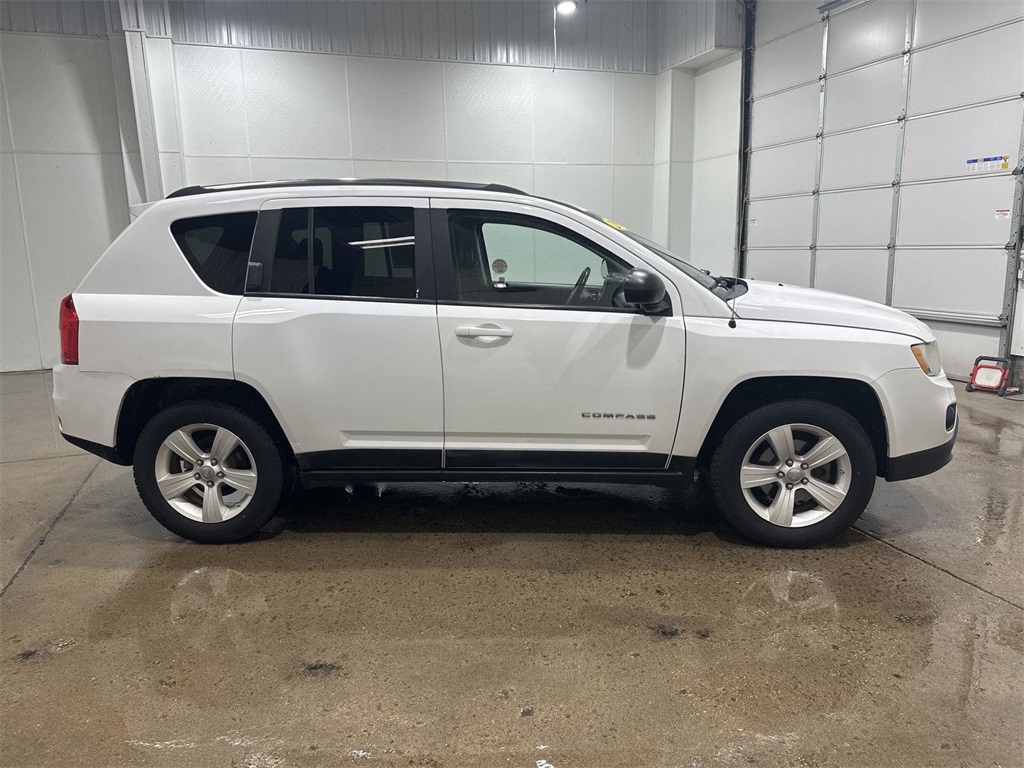 Used 2011 Jeep Compass Base with VIN 1J4NF1FB3BD283793 for sale in West Burlington, IA