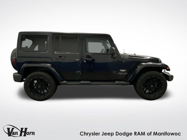 Used 2015 Jeep Wrangler Unlimited Sahara with VIN 1C4BJWEGXFL514976 for sale in Manitowoc, WI