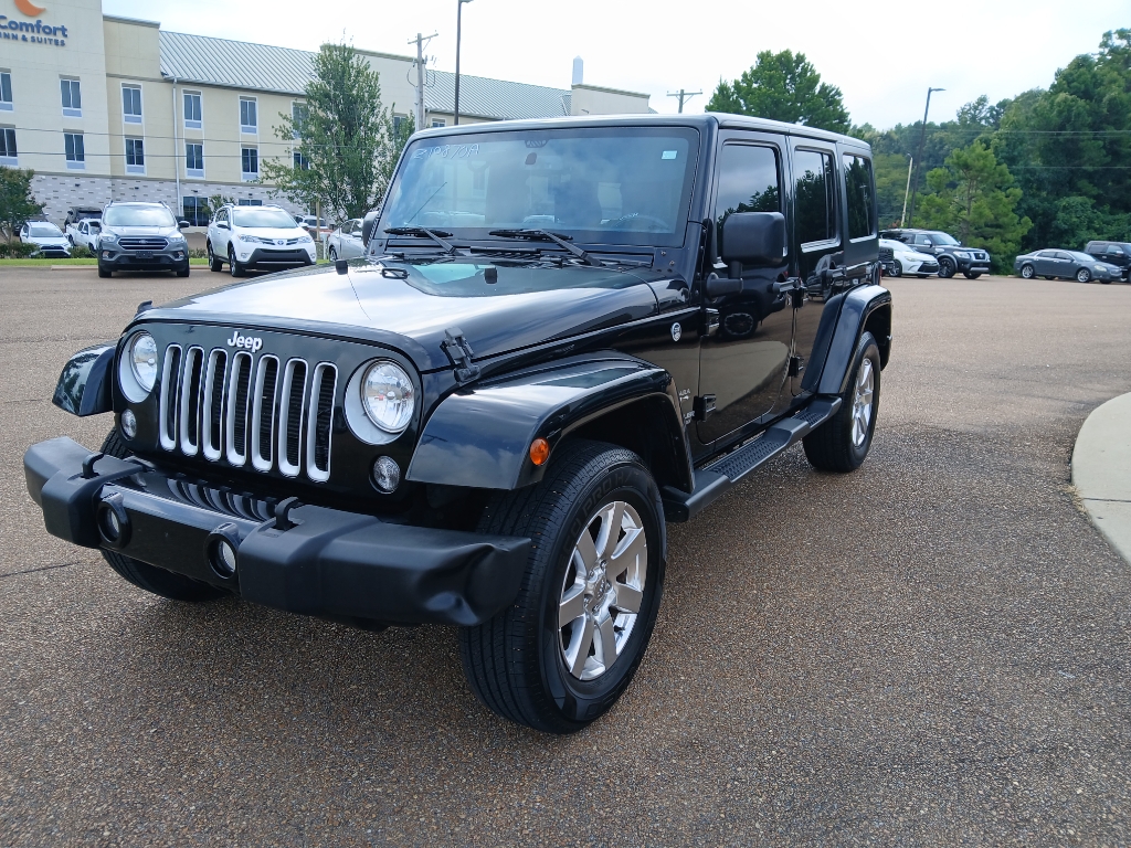 Used 2016 Jeep Wrangler Unlimited Sahara with VIN 1C4BJWEG0GL108240 for sale in Grenada, MS