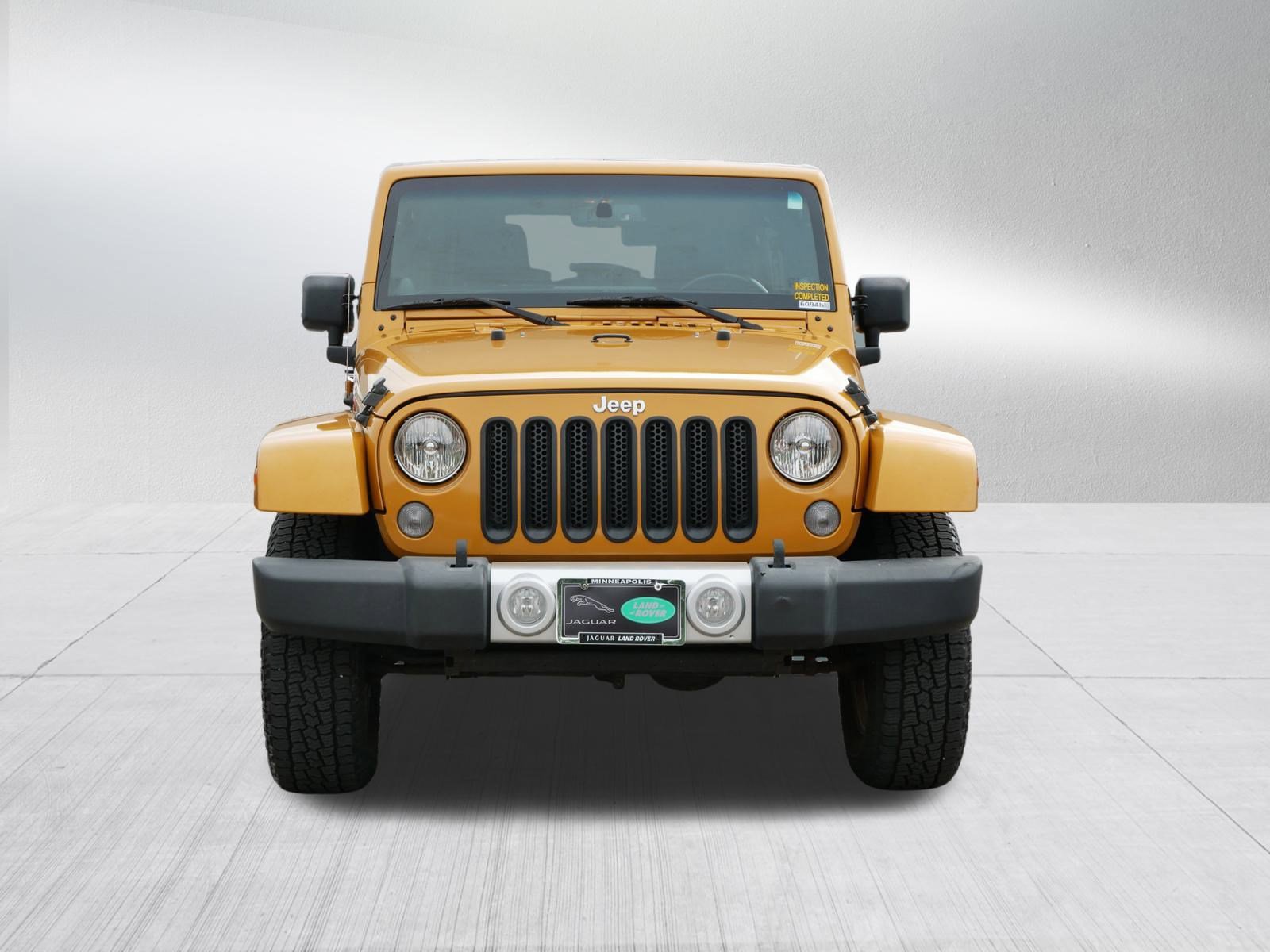 Used 2014 Jeep Wrangler Unlimited Sahara with VIN 1C4BJWEGXEL186571 for sale in Minneapolis, Minnesota