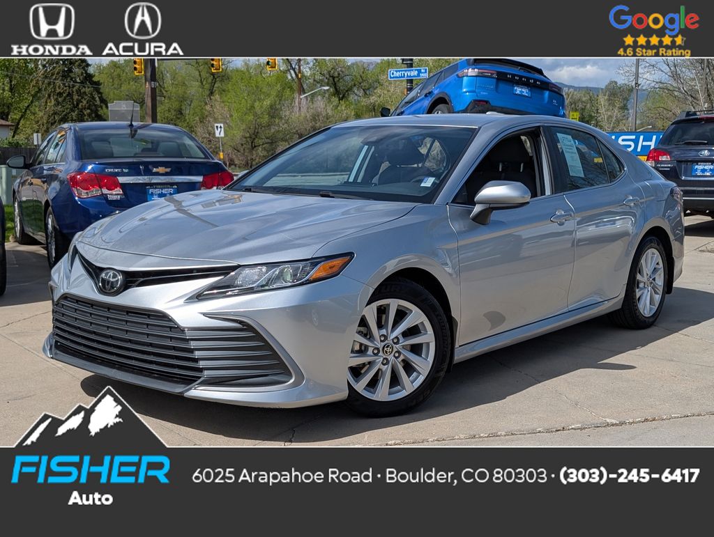 Used 2023 Celestial Silver Metallic Toyota LE image 1
