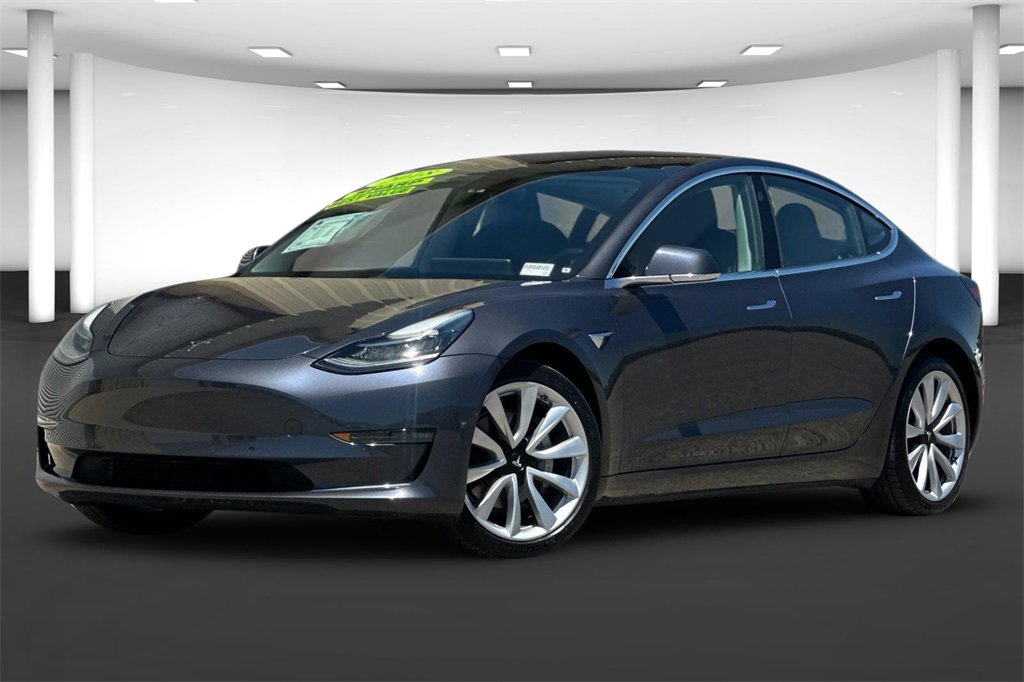 Used 2018 Tesla Model 3 Long Range with VIN 5YJ3E1EA5JF049123 for sale in Kerman, CA