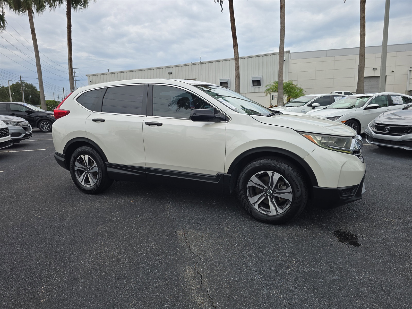 Used 2018 Honda CR-V LX with VIN 5J6RW5H34JL002149 for sale in Port Richey, FL