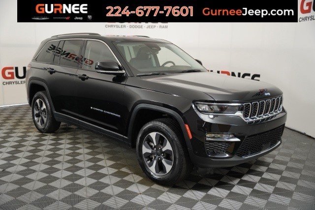 PRE-OWNED 2022 JEEP GRAND CHEROKEE 4XE WITH NAVIGATION & 4WD
