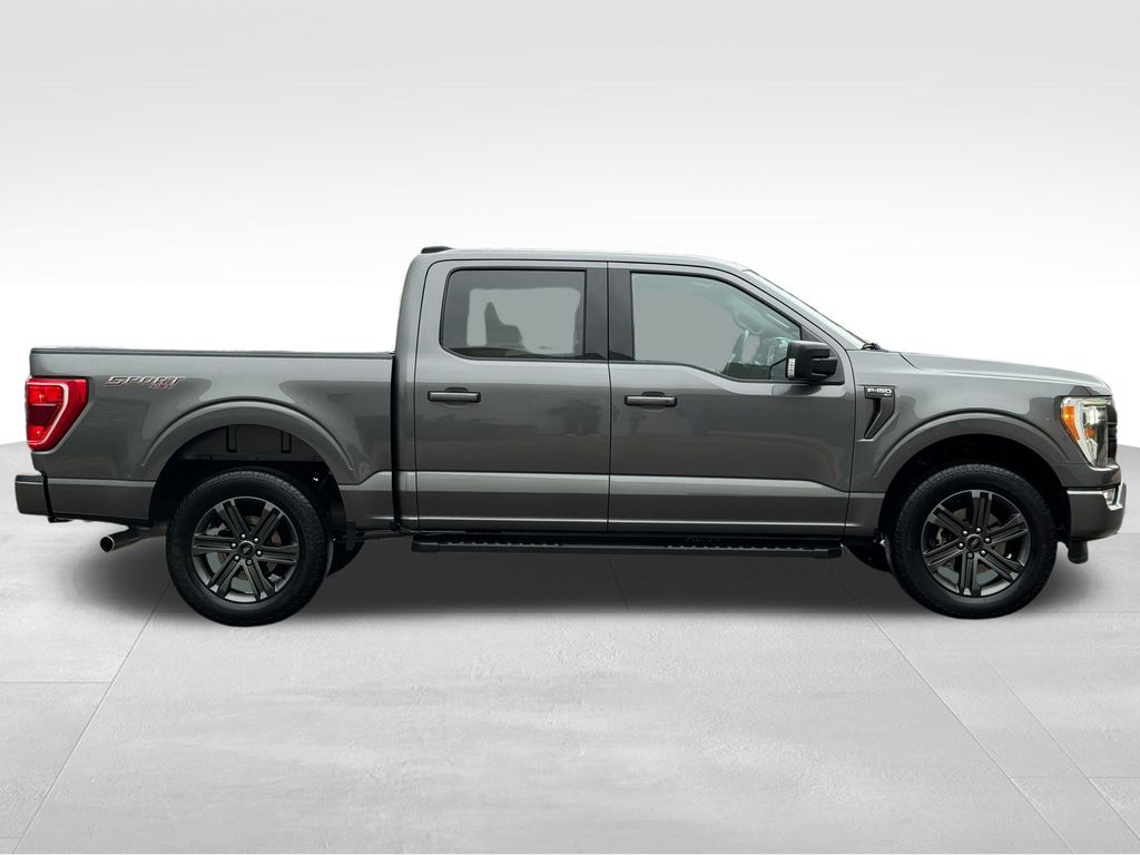 Used 2023 Ford F-150 XLT with VIN 1FTFW1E80PKF80944 for sale in Coon Rapids, Minnesota