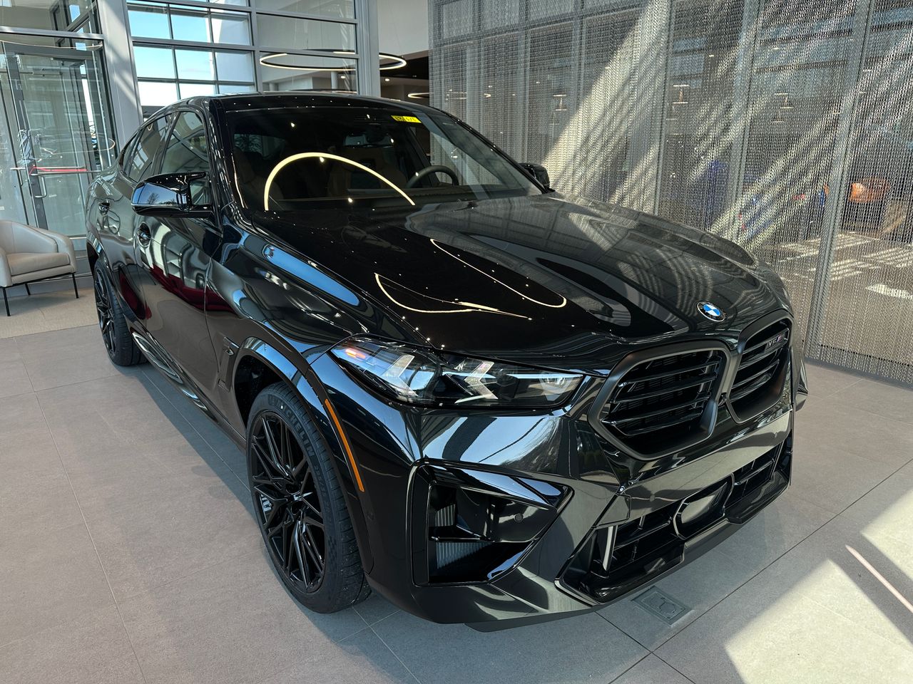 New 2025 Black Sapphire Metallic BMW X6 M image 1