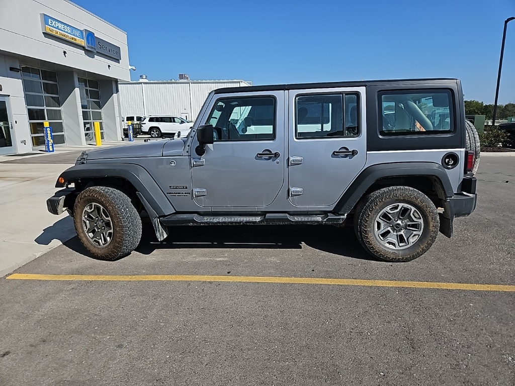 Used 2017 Jeep Wrangler Unlimited Sport with VIN 1C4BJWKG5HL648706 for sale in Kansas City
