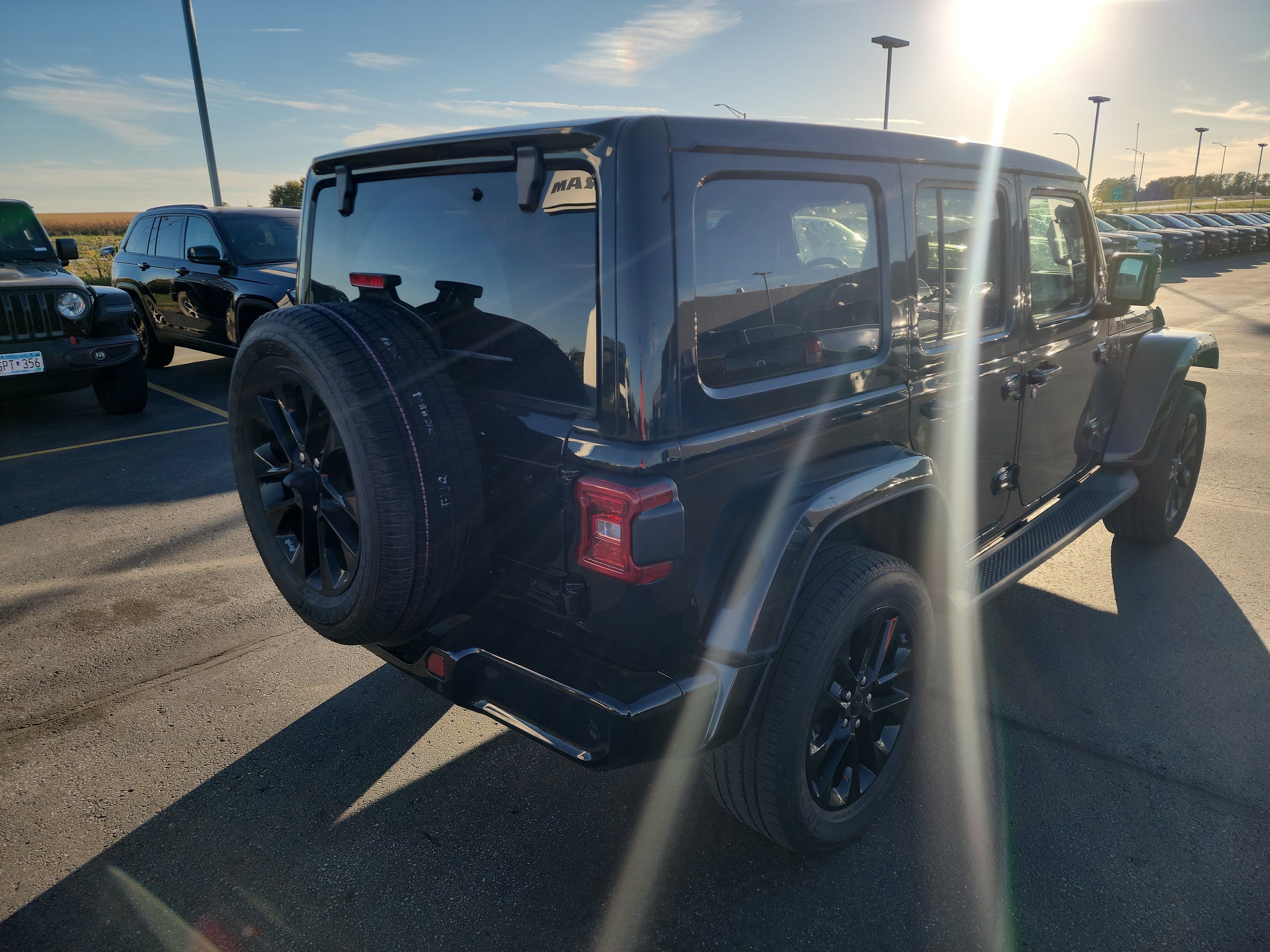 Used 2022 Jeep Wrangler Unlimited High Altitude with VIN 1C4HJXEN5NW193408 for sale in Burnsville, Minnesota