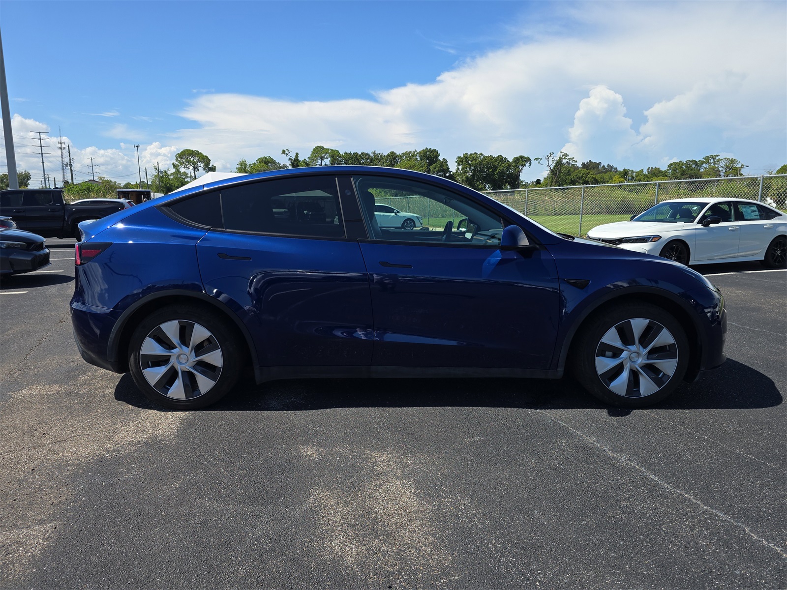 Used 2024 Tesla Model Y Long Range with VIN 7SAYGAEEXRF032755 for sale in Northfield, Minnesota