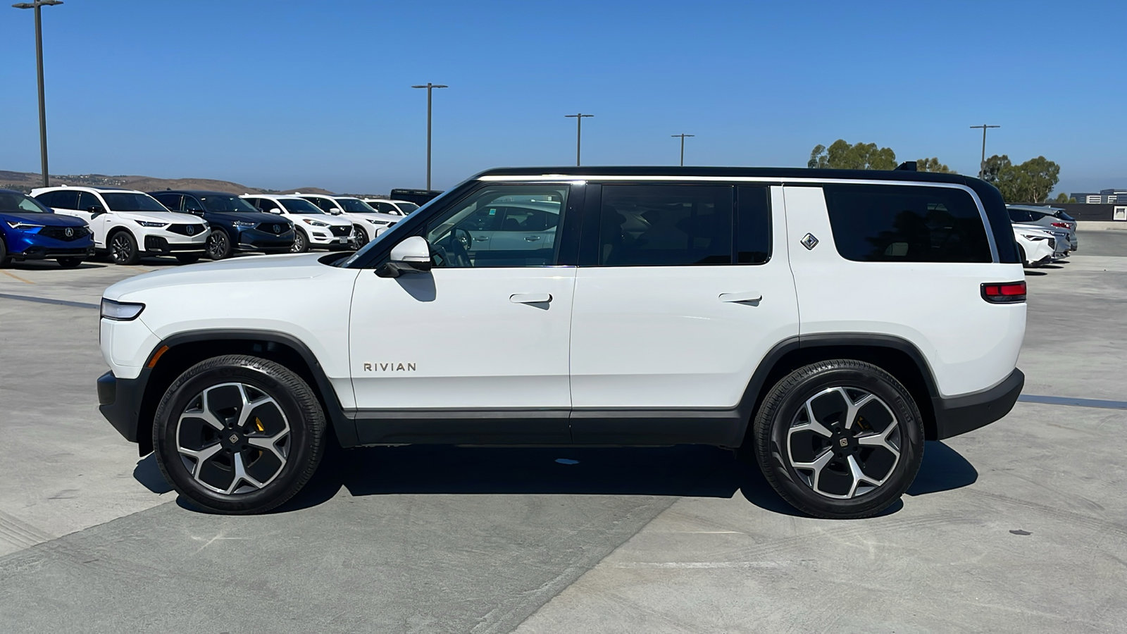 Used 2024 Rivian R1S Adventure with VIN 7PDSGABA6RN043394 for sale in Irvine, CA