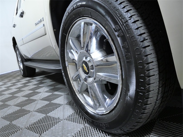 Used 2009 Chevrolet Tahoe LTZ with VIN 1GNFK33059R267040 for sale in Apple Valley, Minnesota