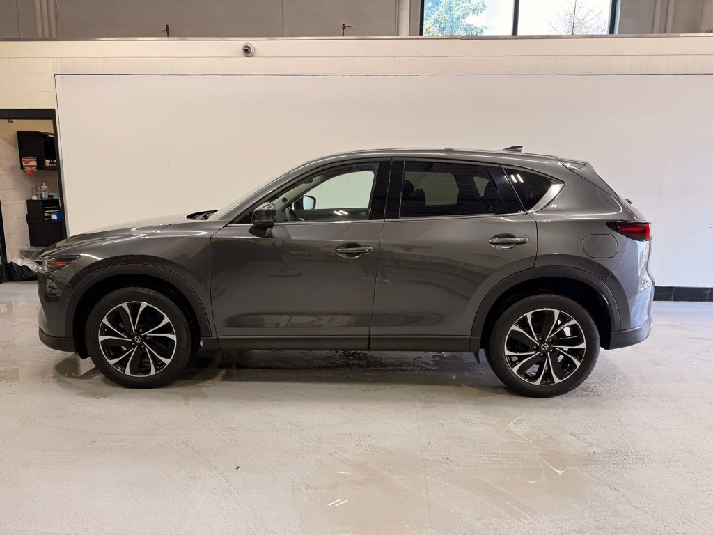 Used 2022 Mazda CX-5 S Premium Plus package with VIN JM3KFBEM0N1610441 for sale in Golden Valley, Minnesota