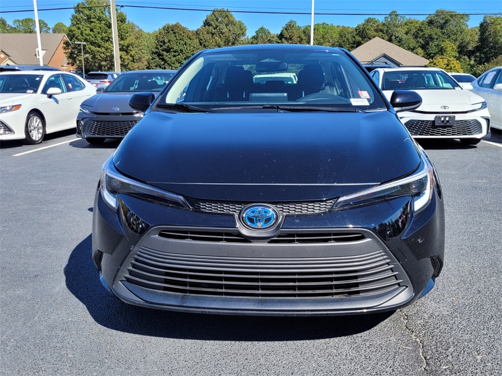 Used 2024 Toyota Corolla LE with VIN JTDBCMFE1RJ031548 for sale in Northfield, Minnesota