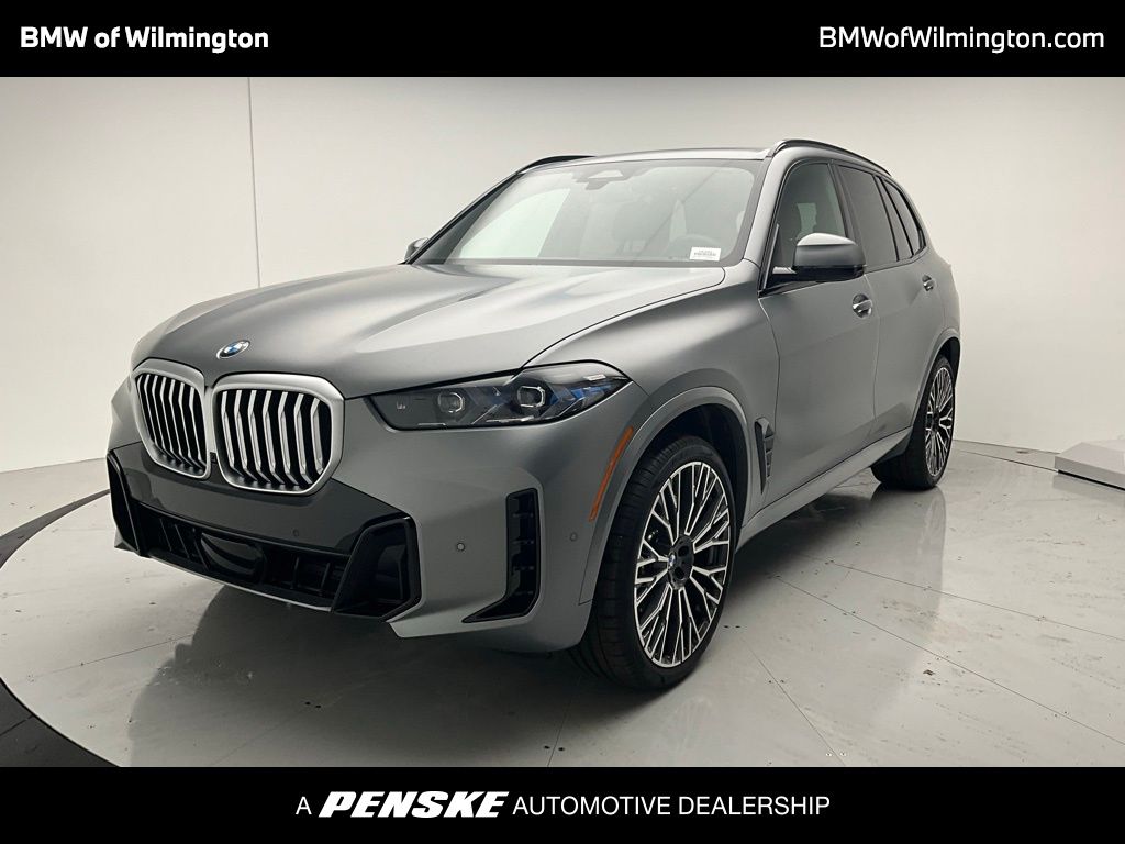 Used 2025 Frozen Pure Grey Metallic BMW xDrive40i image 1