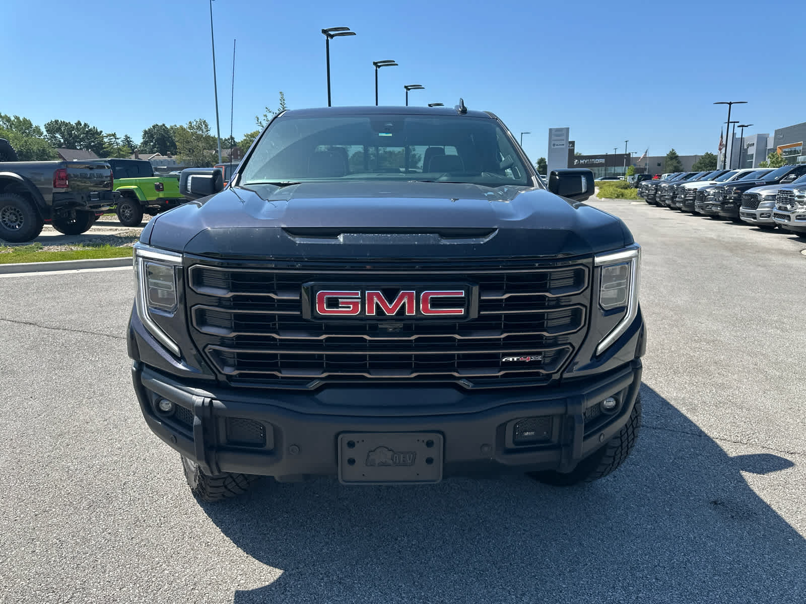 Used 2024 GMC Sierra 1500 AT4X with VIN 3GTUUFE8XRG322189 for sale in Kansas City