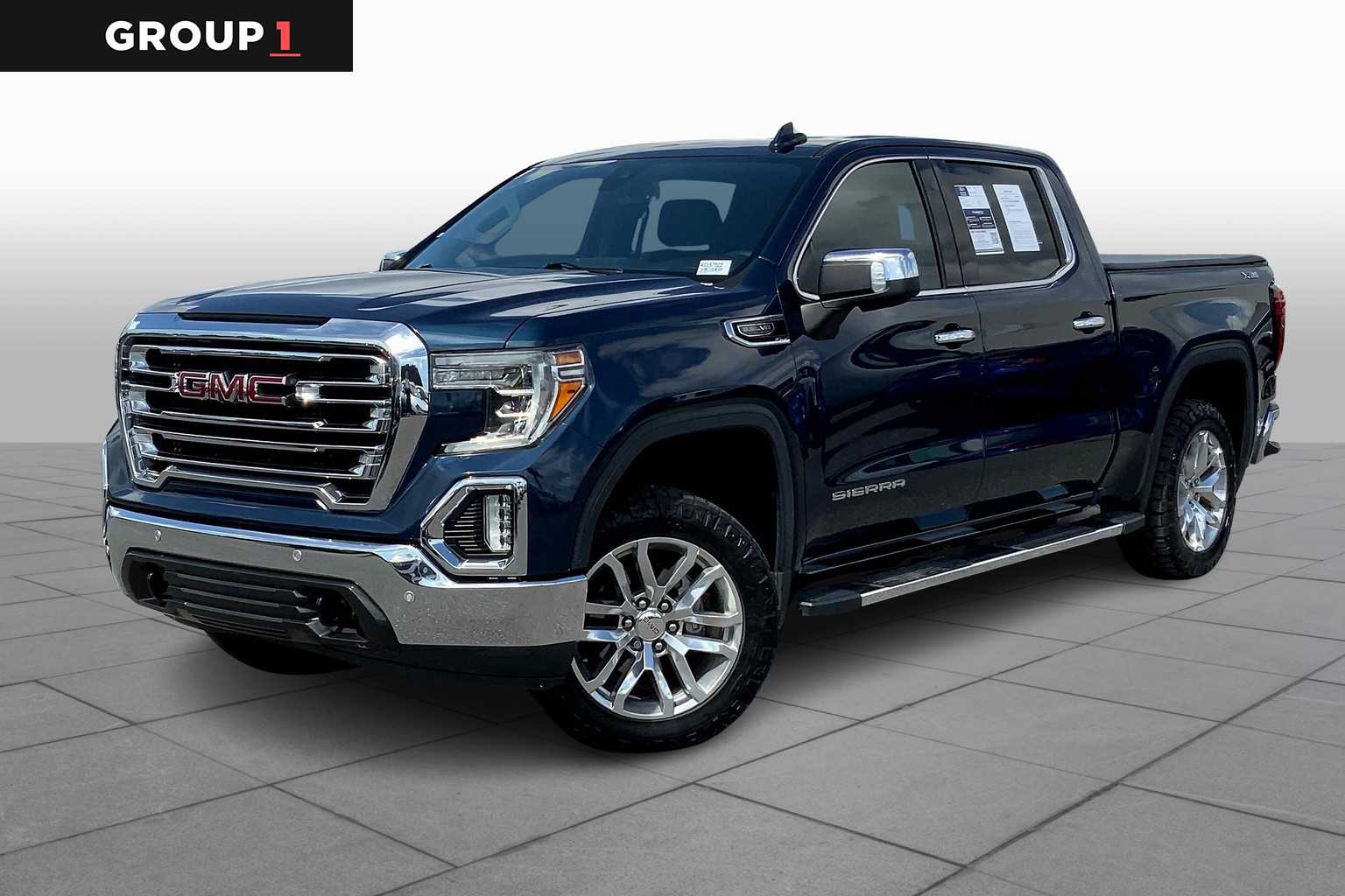 Pre-Owned 2019 GMC Sierra 1500 SLT Crew Cab Pickup in Estero