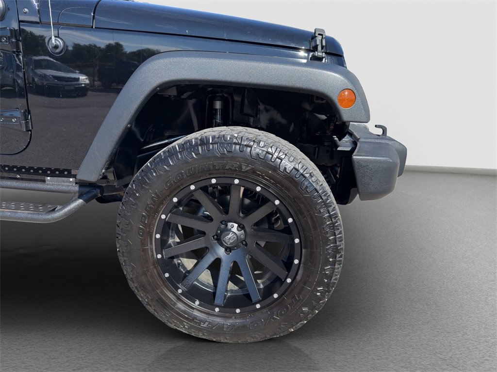 Used 2018 Jeep Wrangler JK Unlimited Sport with VIN 1C4BJWDG1JL853684 for sale in Kansas City