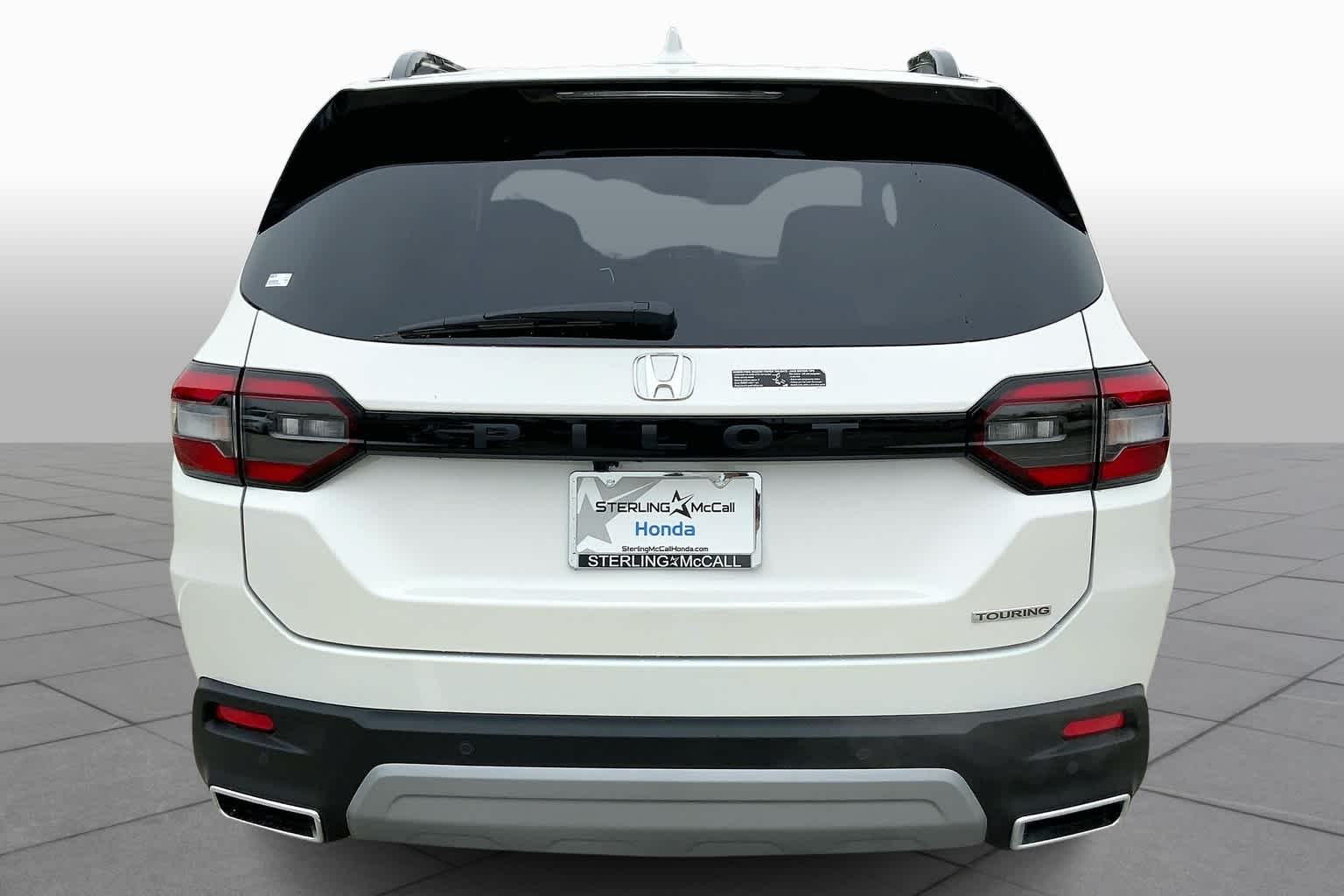 PreOwned 2024 Honda Pilot Touring Sport Utility in Houston RB012709