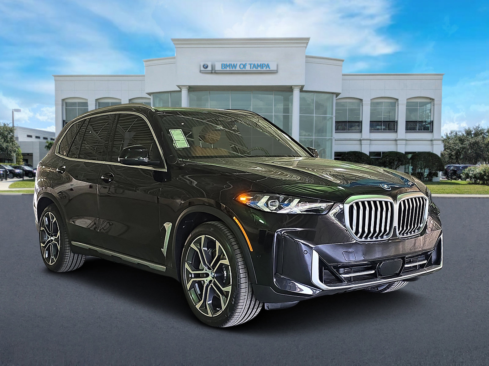New 2025 Black Sapphire Metallic BMW xDrive50e image 1