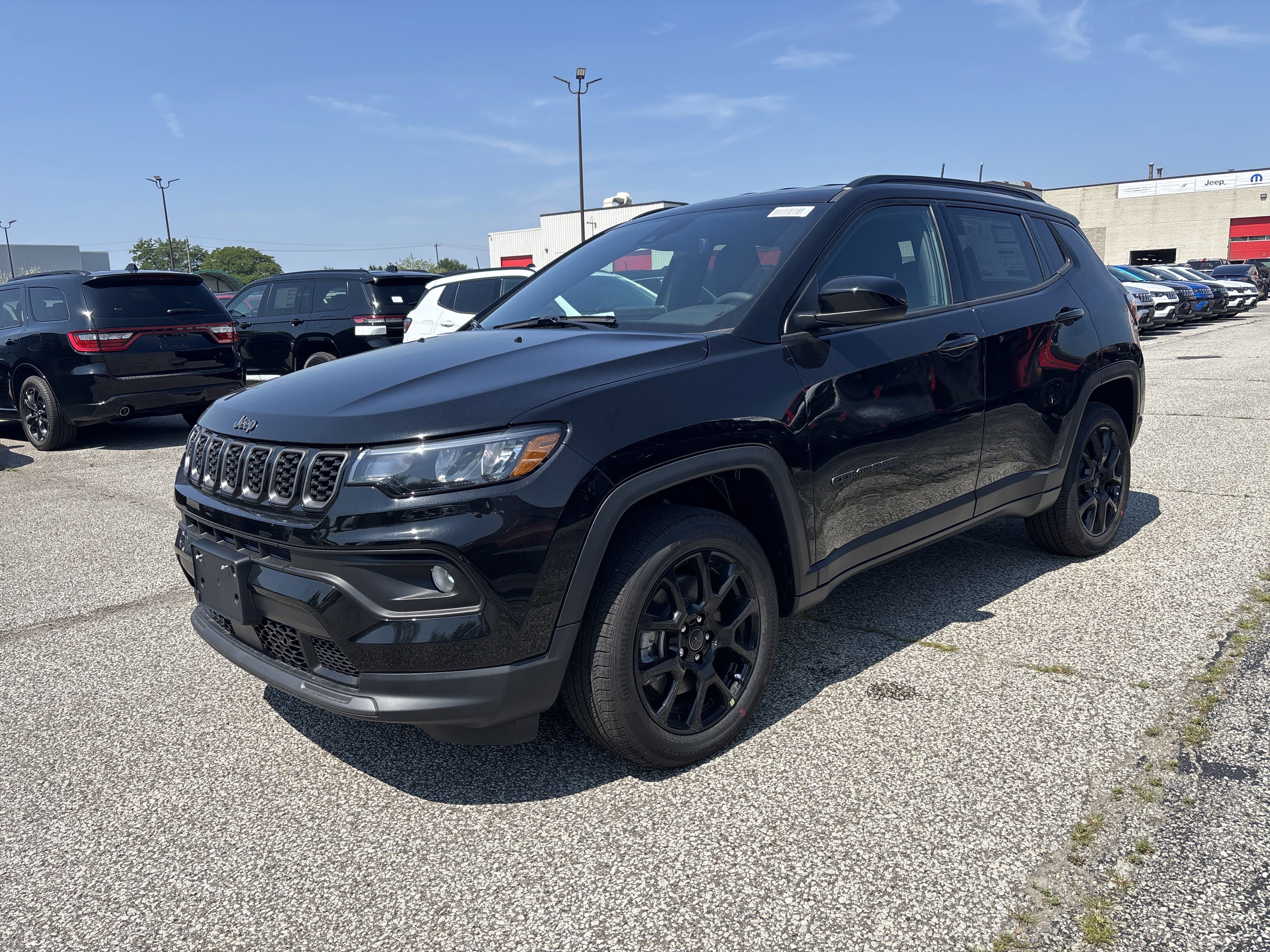 New 2025 Diamond Black Crystal Pearl Jeep Altitude image 1
