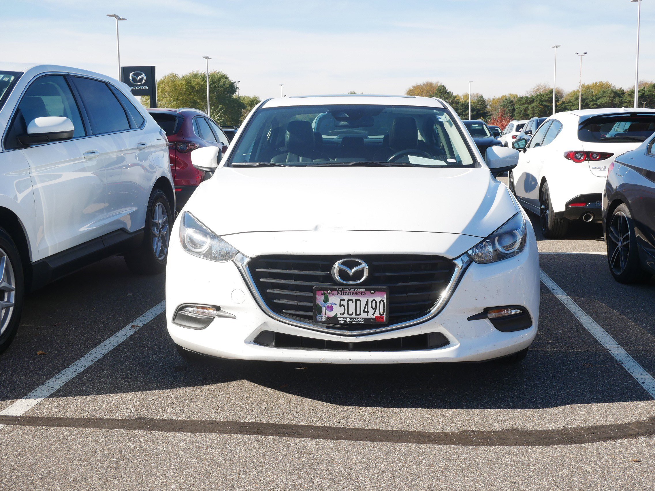 Used 2018 Mazda Mazda3 Touring with VIN 3MZBN1V32JM227947 for sale in Brooklyn Center, Minnesota